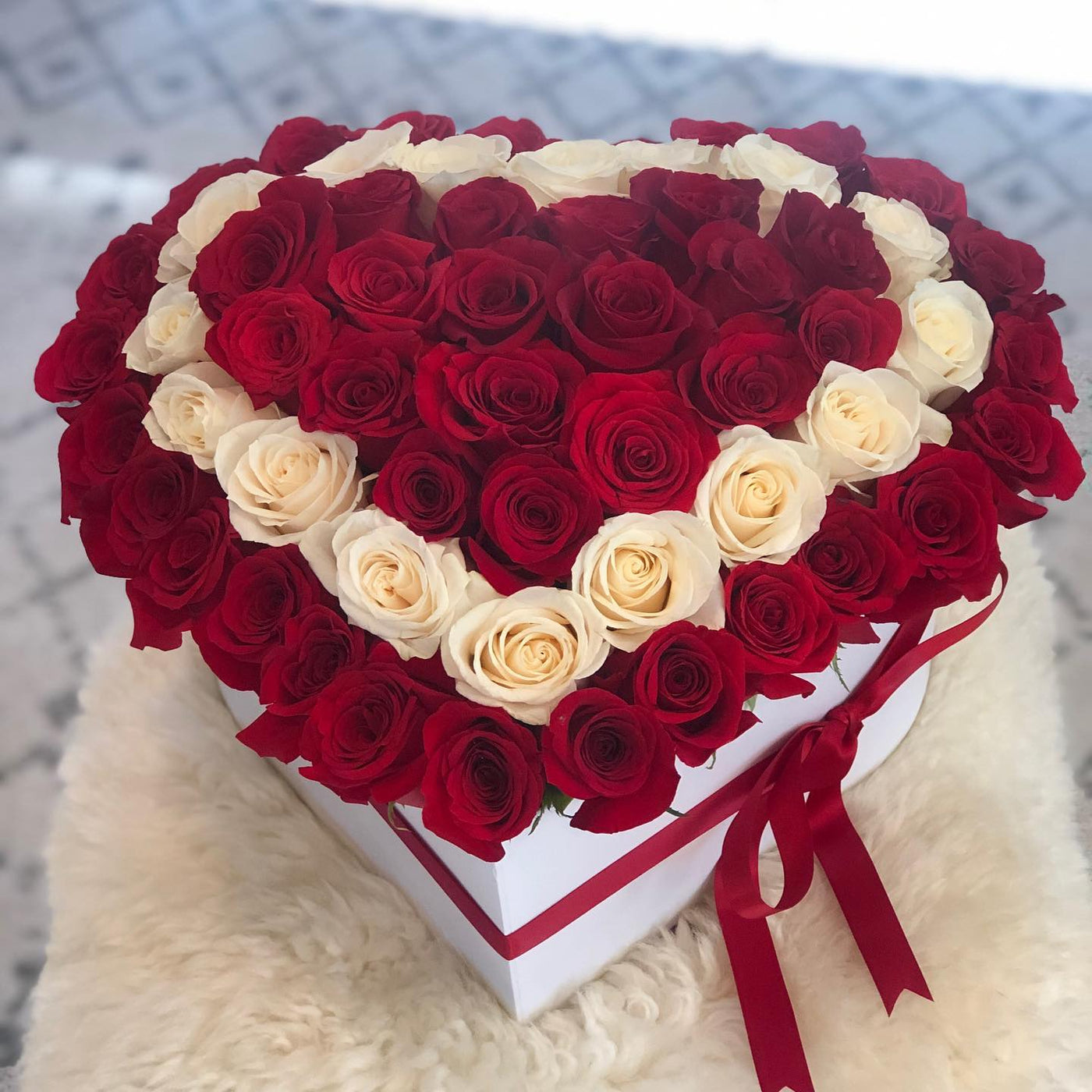 50 Fresh Roses in Heart Shape Hat Box